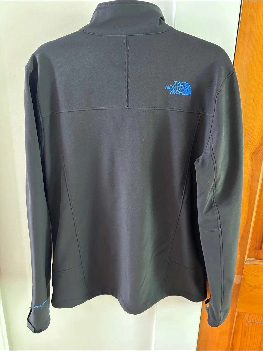 The North Face Black Jacket with Blue Accents